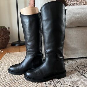 Black knee high riding boots